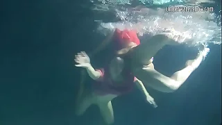 A handful of hot lesbians underwater emotive each-other. y. s are naked surrounding the pool. Young nudists ..